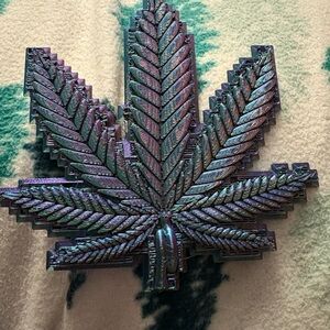Vibrant Green and Purple Cannabis Leaf Art